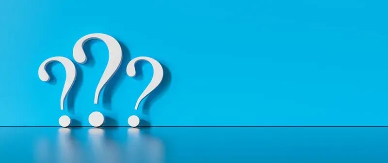3 question marks on a blue bkrd