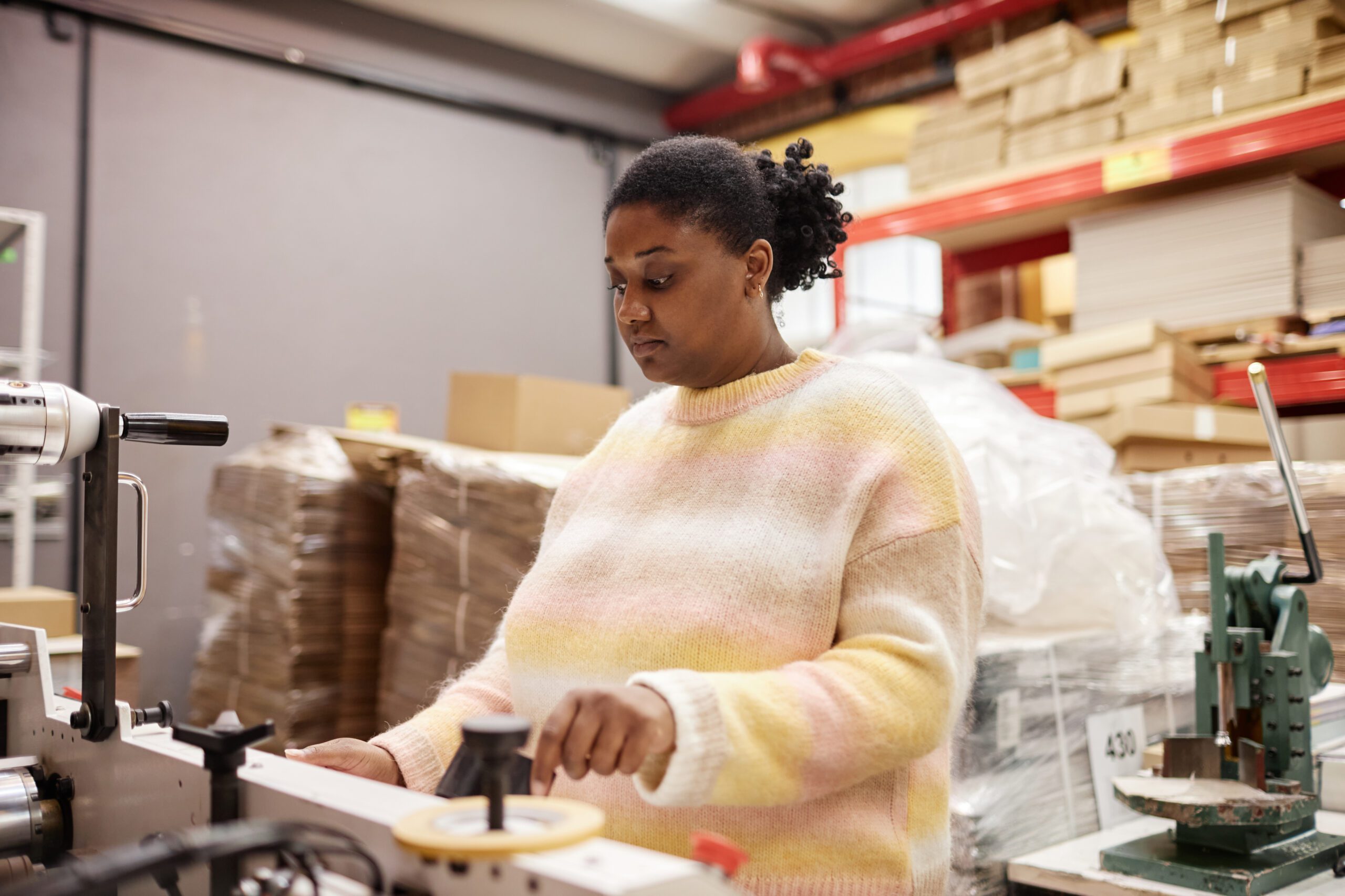Woman Operating Printing Machine