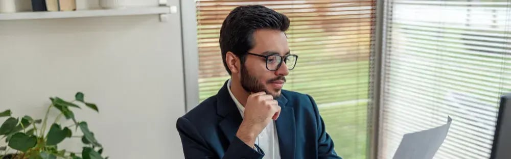 businessman contemplating