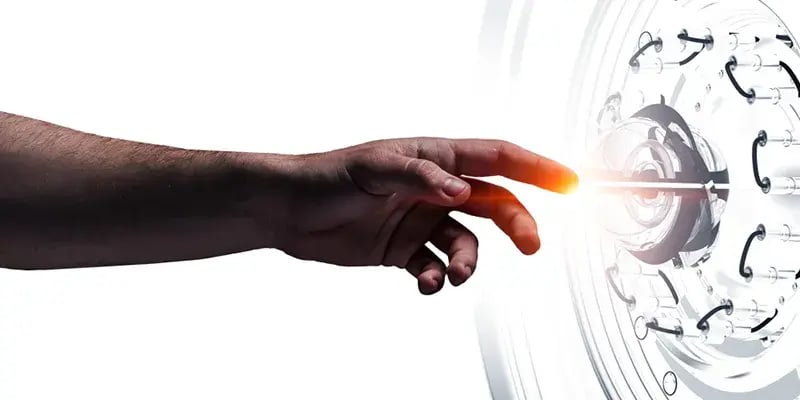 hand starting a futuristic machine