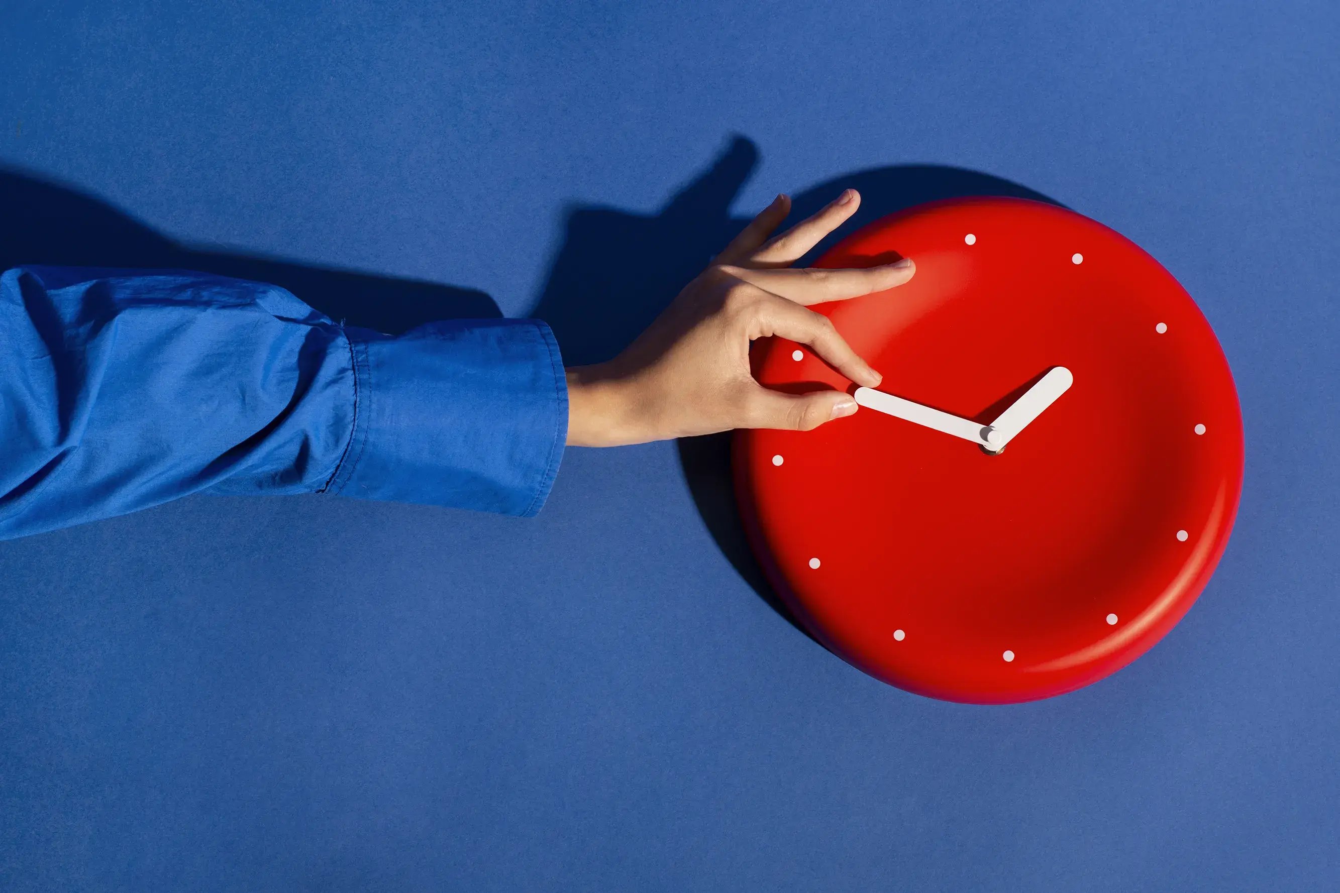 hand-holding-wall-clock-still-life copy
