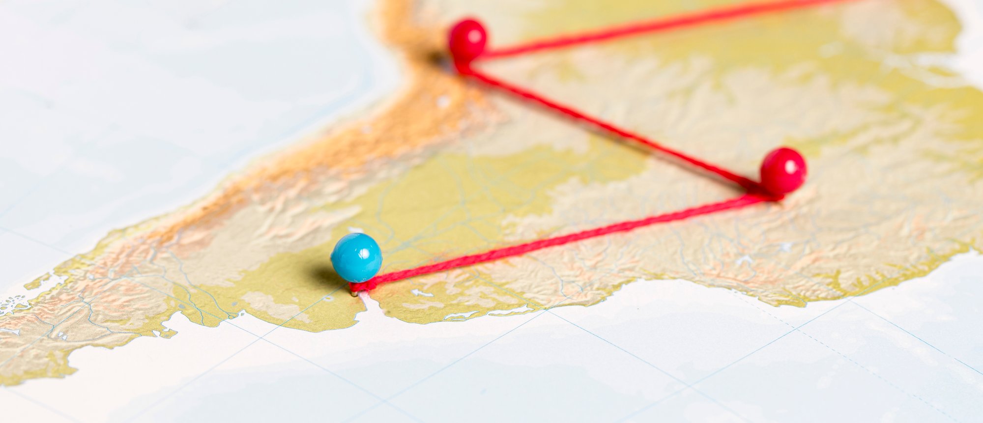 pushpins-with-thread-route-map