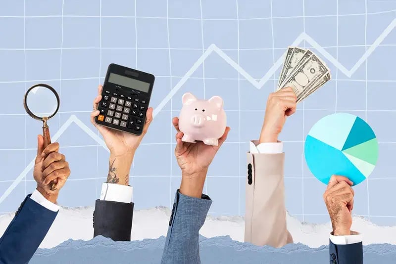 hands holding up elements of raising funds for a business